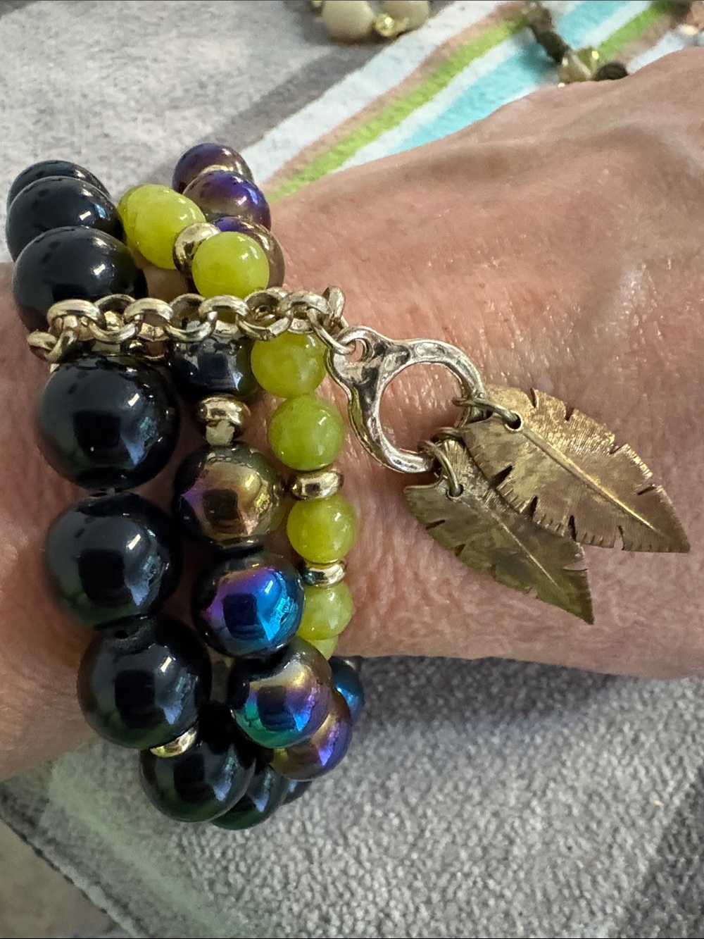 Coldwater Creek Black, Iridescent & Lime Beaded Bracelet with Gold Leaf Charms